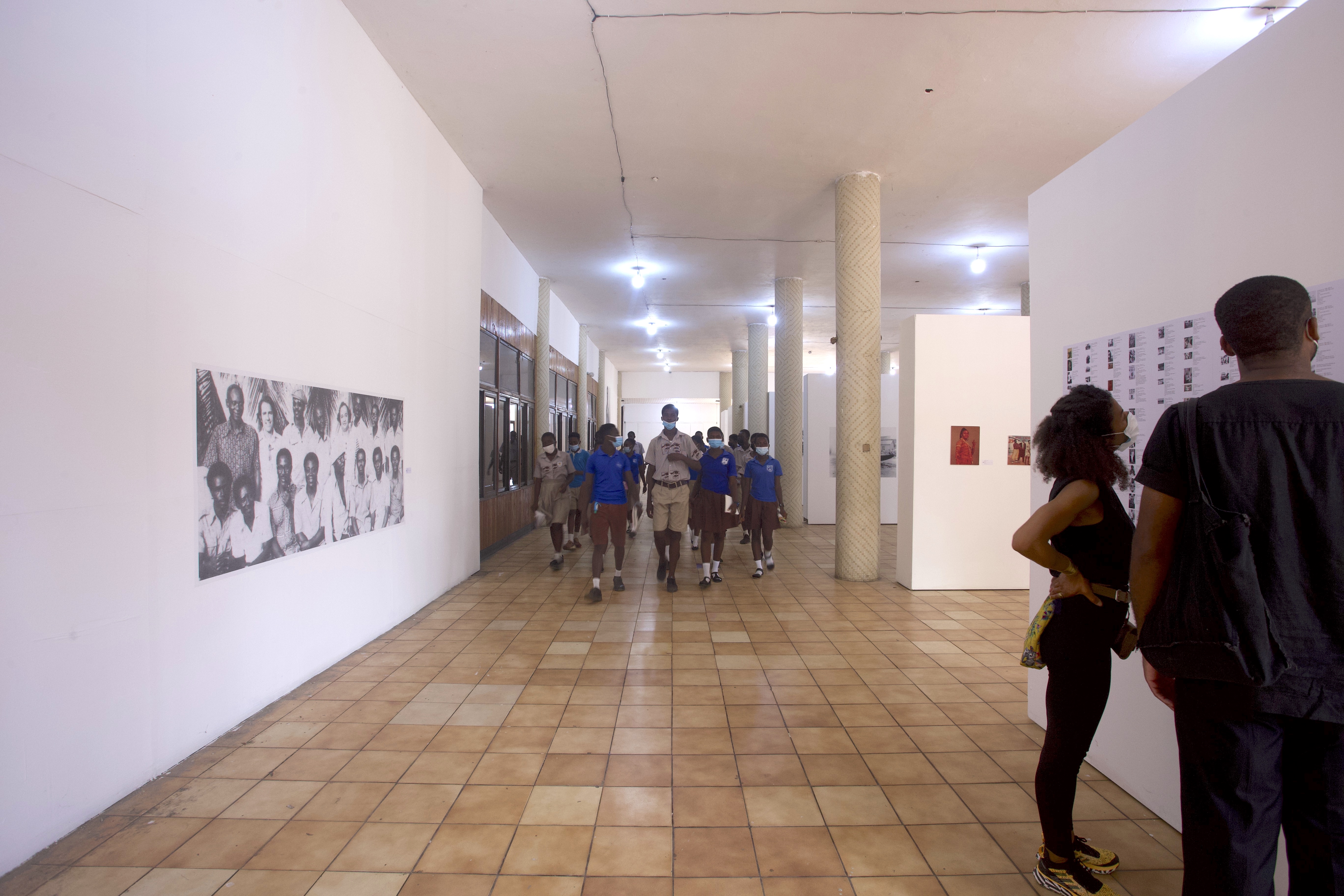 A diversity of audiences visit the Simply Iconic exhibition at the Museum of Science and Technology, Accra