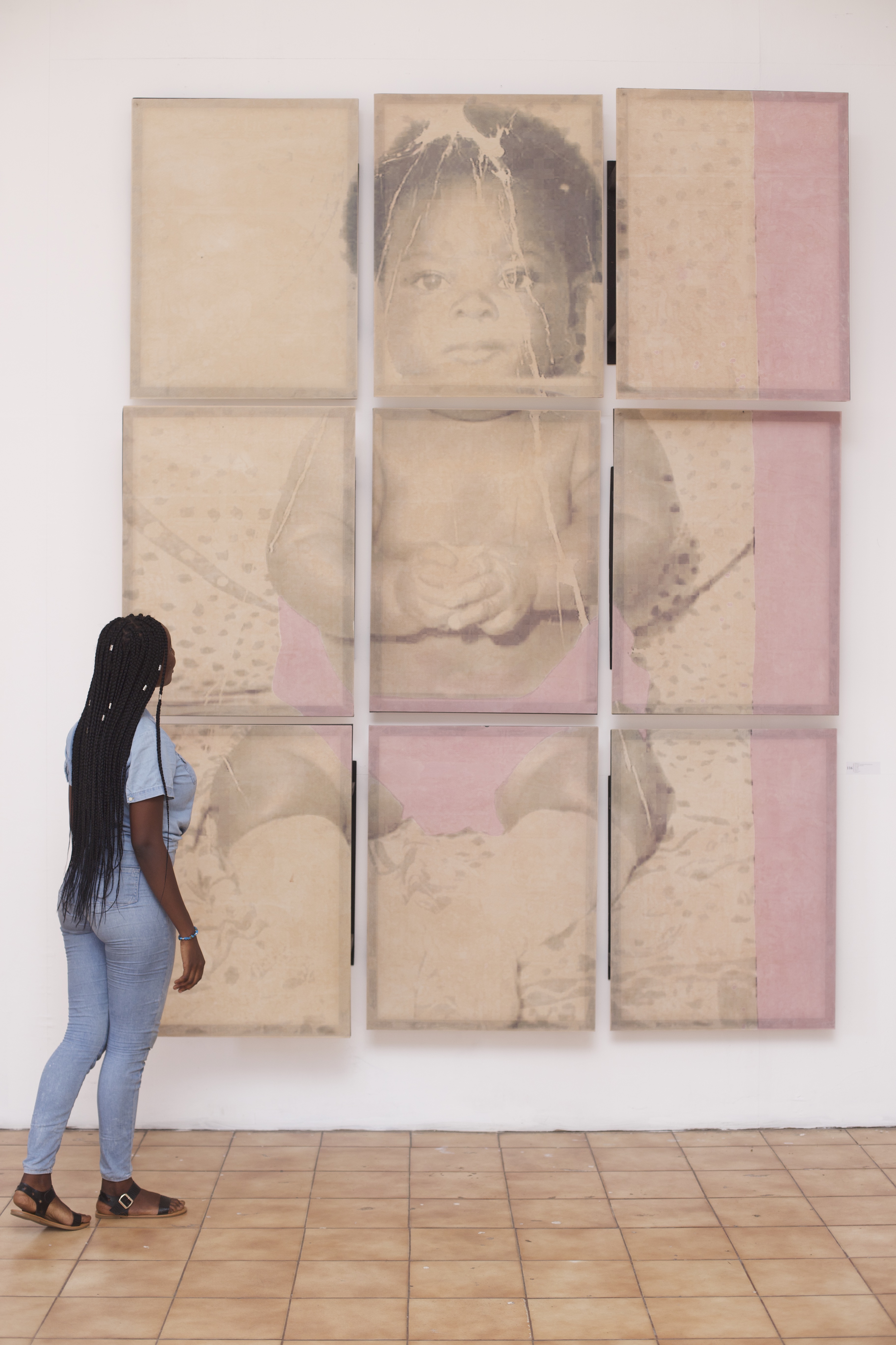 Artistic intervention, by Fredrick Botchway, MFA student of KNUST. Botchway uses archival images in creating giant-sized paintings using a combination of paints and cooking oils